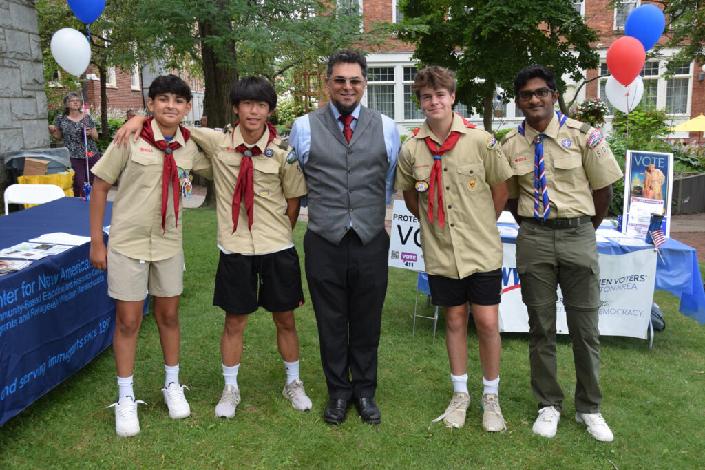 CNA Attorney Alex Kaezem with area Boy Scouts, who served as color guard for the July 4 naturalization ceremony.